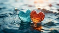 Two glass hearts in water. Valentines day background. Love concept Royalty Free Stock Photo