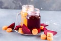 Two glass jar mugs with Freshly Made Vegetable Juices .Carrot, Beet. Vegetarian food. Healthy life.