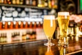 A two Glass of light beer on a pub with bokeh background Royalty Free Stock Photo