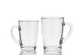 Two glass mugs isolated on white background Royalty Free Stock Photo