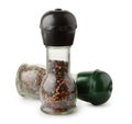 Two glass pepper mills