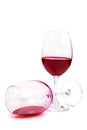 Two glass of red wine one of them lies Royalty Free Stock Photo