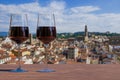 Two glass of red wine with view from above of Florence historic city center in Italy Royalty Free Stock Photo