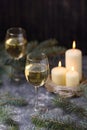 Two glass wine and candles with christmas tree Royalty Free Stock Photo