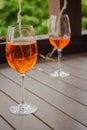 Two glasses of Aperol Spritz cocktail. Wineglasses with rose wine. Outdoor bar. Sidewalk cafe table. Alcohol party. Royalty Free Stock Photo