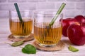 Juice from red apples in glasses. Close-up. Royalty Free Stock Photo