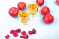 Two glasses of apple juice and red apples on wooden background Royalty Free Stock Photo