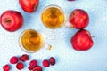 Two glasses of apple juice and red apples on wooden background Royalty Free Stock Photo