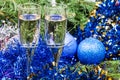 Two glasses with blue Xmas decorations and tree 8 Royalty Free Stock Photo