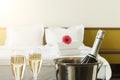 Two glasses and bottle of champagne in hotel Royalty Free Stock Photo