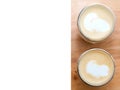 Two glasses with cappuccino or latte. place for text. coffee on a background of a table from a cafe. top view Royalty Free Stock Photo