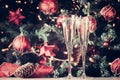 Two glasses of champagne with Christmas tree background and spar Royalty Free Stock Photo