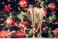 Two glasses of champagne with Christmas tree background. Holiday Royalty Free Stock Photo