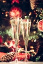 Two glasses of champagne with Christmas tree background. Holiday Royalty Free Stock Photo