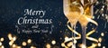 Two glasses of champagne with golden confetti, glitter, serpentine and lights Royalty Free Stock Photo