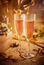 Two glasses of champagne with home decoration in golden tone for holiday party Royalty Free Stock Photo