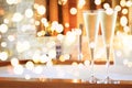 Two glasses of champagne near jacuzzi. Valentines background. Romance concept. Bold festive bokeh