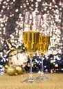 Two glasses of champagne at New Year`s Eve party golden shiny background stock images Royalty Free Stock Photo