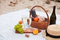 Two glasses of champagne. Picnic on the beach at sunset in the w