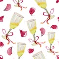 Two glasses of champagne, pink ribbon and falling rose petals. Royalty Free Stock Photo