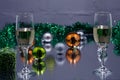 Two glasses of champagne ready for christmas celebration, on purple background