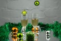 Two glasses of champagne ready for christmas celebration, on red background