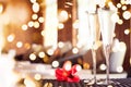 Two glasses of champagne with red flower in a spa lounge. Spa time concept. Spa lounge area. . Bold festive bokeh Royalty Free Stock Photo