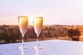 Two glasses of champagne at rooftop restaurant
