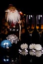 Two glasses champagne, Santa Claus and Christmas decoration Royalty Free Stock Photo