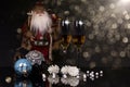 Two glasses champagne, Santa Claus and Christmas ornaments Royalty Free Stock Photo