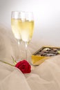 Two Glasses of Champagne, Single Red Rose and a Box Chocolates #4 Royalty Free Stock Photo