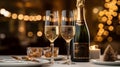 Two glasses of champagne on a table in a restaurant with Christmas decorations