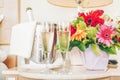 Two glasses of champagne in the upscale hotel room. Dating, romance, honeymoon, valentine, getaway concepts Royalty Free Stock Photo