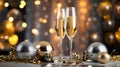 Two glasses of champagne on white table with party ornament and balloons in gold and silver colors, with beautiful light bokeh, Royalty Free Stock Photo