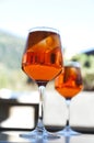 Two glasses with a cocktail Aperol in a street cafe Royalty Free Stock Photo