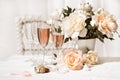 Two glasses filled with pink Champagne