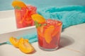 Two glasses with fresh homemade peach sweet iced tea or cocktail, lemonade with mint. Marine theme. Refreshing cold Royalty Free Stock Photo