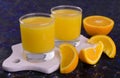 Two glasses of fresh organic orange juice. Close-up. Royalty Free Stock Photo