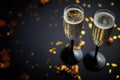 Two glasses full of sparkling champagne wine with golden decoration Royalty Free Stock Photo