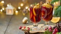 Two glasses of gluhwein. Christmas decoration. Selective focus, blurred background, copy space Royalty Free Stock Photo