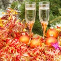 Two glasses with gold Xmas decorations and tree 6 Royalty Free Stock Photo