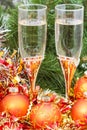 Two glasses with gold Xmas decorations and tree 7 Royalty Free Stock Photo