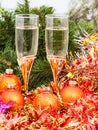 Two glasses with gold Xmas decorations and tree 5 Royalty Free Stock Photo