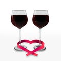 Two glasses of good red wine and a ribbon heart shaped Royalty Free Stock Photo