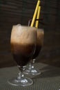 Two glasses of ice coffee with milk with straws Royalty Free Stock Photo