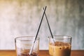 Two glasses of iced coffee with stainless steel drinking straw Royalty Free Stock Photo