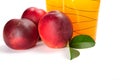 Two glasses of juice and fresh peaches on white background Royalty Free Stock Photo