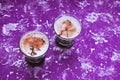 Two glasses of latte on a purple background. Top view. Place for text Royalty Free Stock Photo