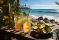 Two glasses of lemonade with ice cubes and lime slices on a wooden table by the ocean Royalty Free Stock Photo