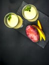 Two glasses of mango lassi from above Royalty Free Stock Photo